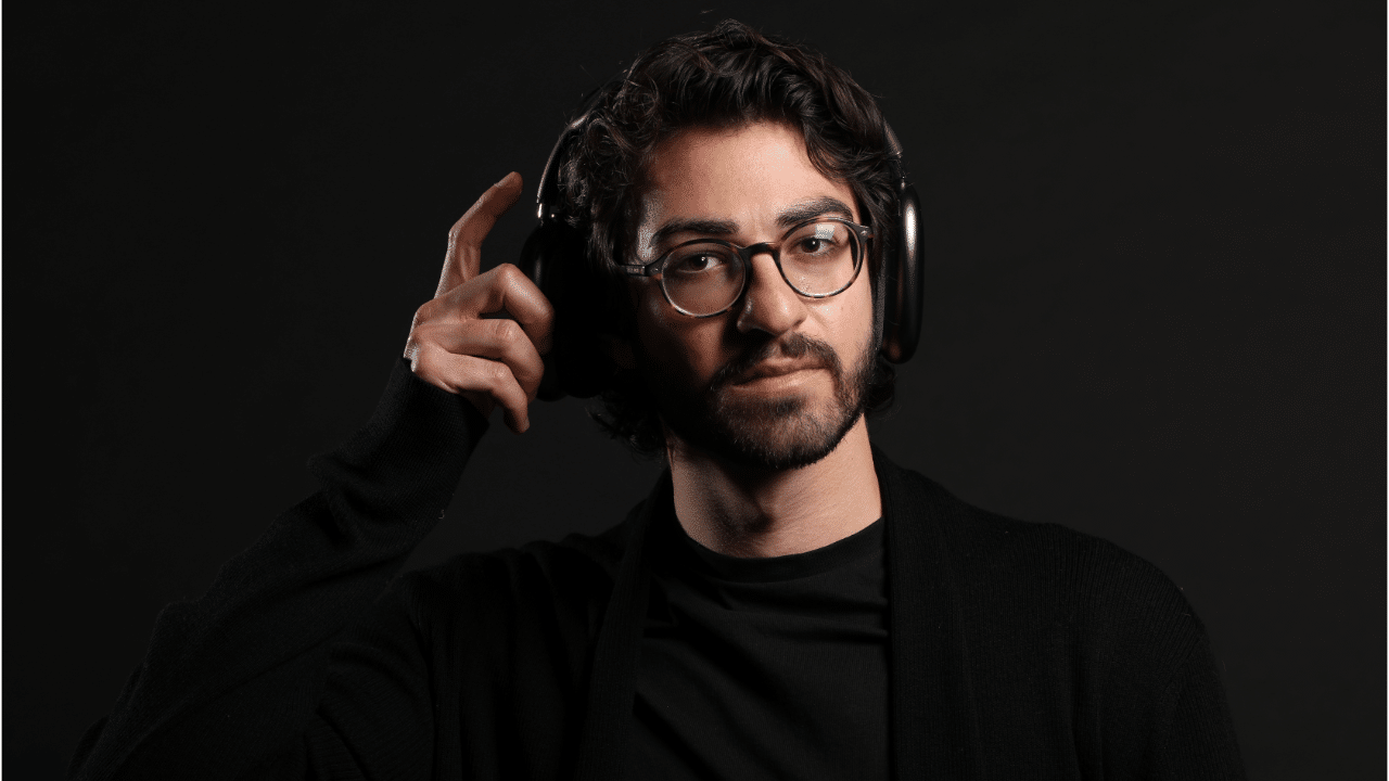 Podeo CEO and co-founder, Stefano Fallaha removing some headphones