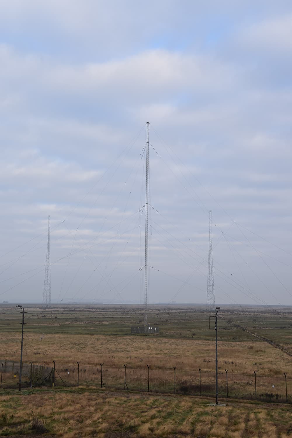 Radio Caroline mast in the foreground at Orfordness.