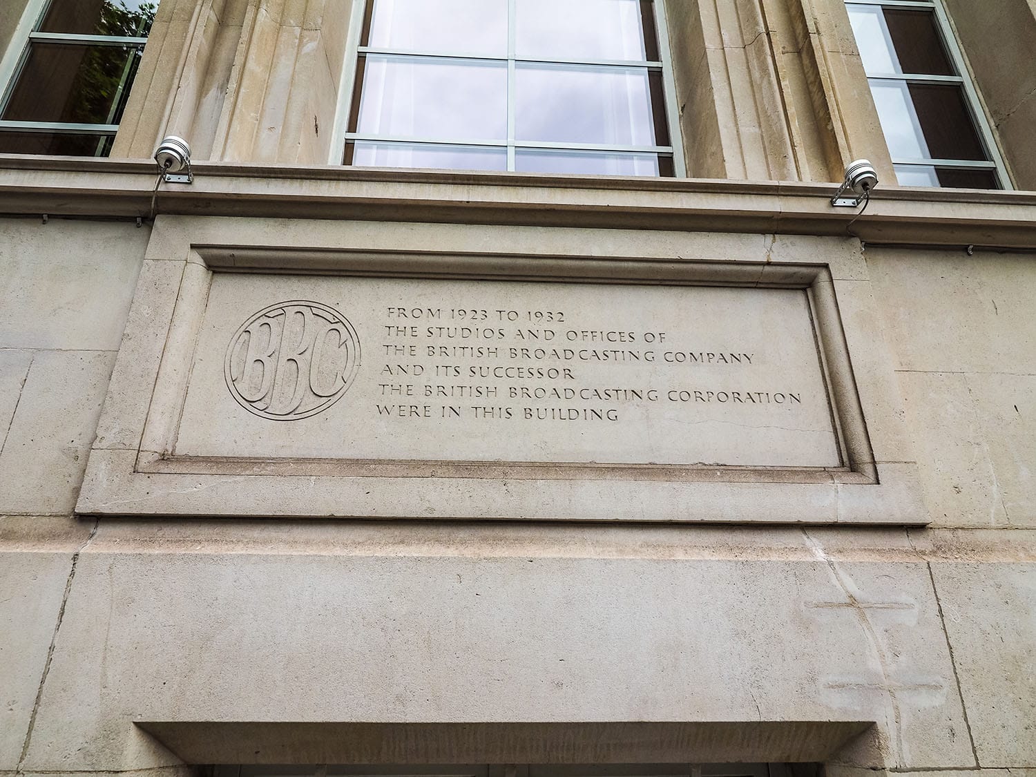Engraved stone commemorating the site of the first BBC studios at Savoy Hill on The Strand in central London. Credit: Shutterstock