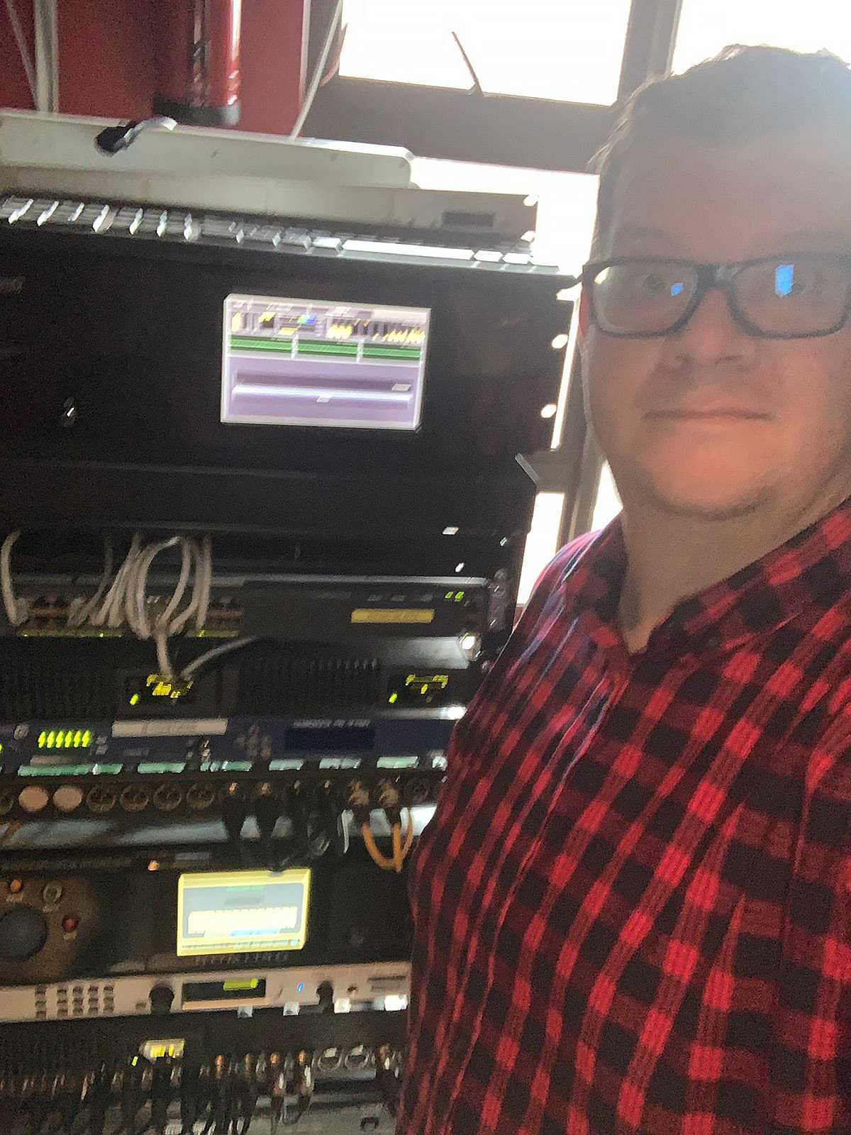 Gareth Cherry of Hot1027 shows the stations audio processing and linking hardware.