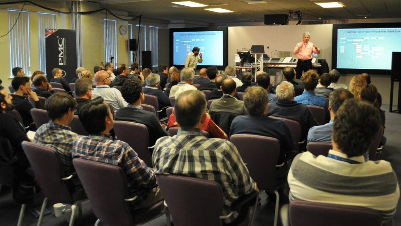 A crowd of people attending an educational seminar
